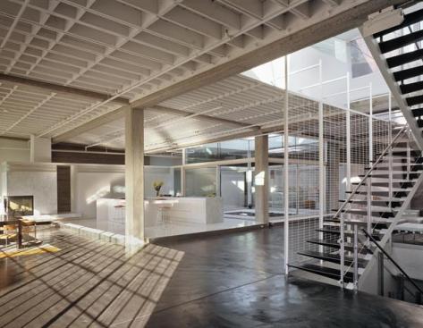 Anne Fougeron adapted the warehouse with sustainability in mind too. The kitchen's sliding glass doors open to an interior courtyard that supplies fresh air, and radiant heat in the concrete floors, abundant daylighting, and dimmable fixtures help to reduce energy loads
