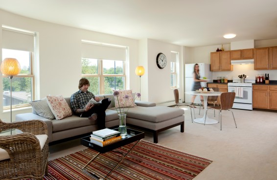 The+apartments+incorporate+a+simple+palette+of+natural+and+sustainable+materials%2c+including+hardwood+cabinets%2c+Marmoleum+floors%2c+Energy+Star+lighting+and+appliances%2c+low+flow+fixtures+and+low+VOC+paints.