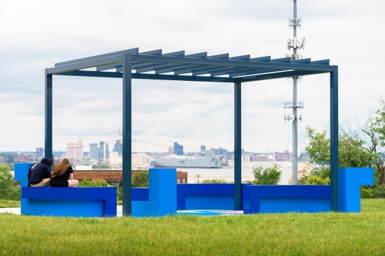 Local residents gazing out over the city as the sun sets.