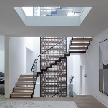 Atelier RZLBD / Stack House / staircase, terracotta screen