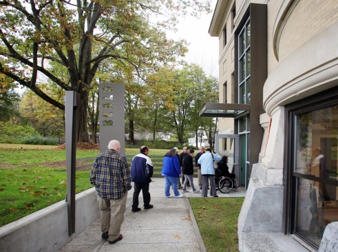 What was basement is now light-filled library directly on the park through careful grading and detailing 