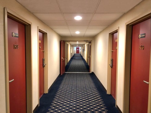 Guestroom corridors, before remodeling, were boring and oppressive. 