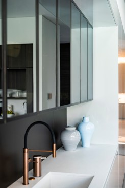 Serenity Indian Wells luxury home modern mirrored kitchen cabinets