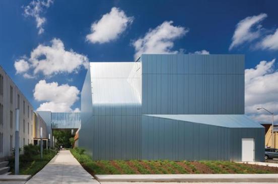 The Reynobond cladding is treated with a specially formulated stain from PPG Industries that takes it from aluminum to a deeper shade, more like zinc, Kurtz says. The team selected the coils of metal used for the panels and then took samples to the plant, where the coating was tested.