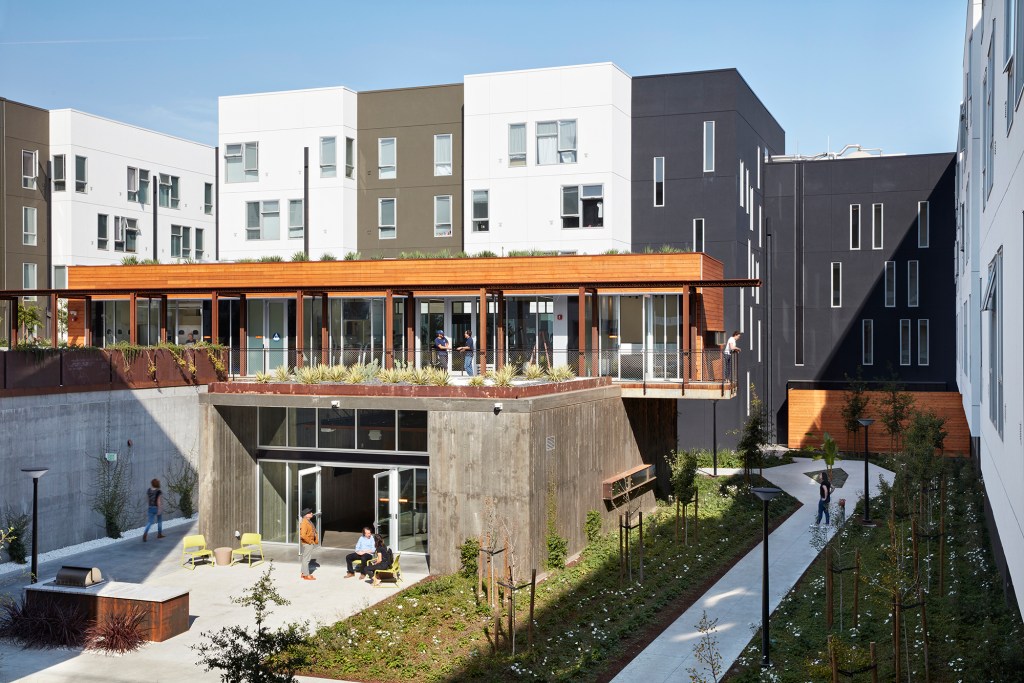 In addition to covered community spaces, the courtyard also features outdoor gardens designed by San Francisco and Seattle firm GLS Landscape I Architecture.