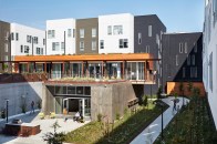 In addition to covered community spaces, the courtyard also features outdoor gardens designed by San Francisco and Seattle firm GLS Landscape I Architecture.