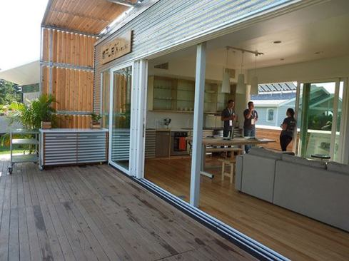 The louvers along the roof line and the east-facing screens are fixed at the calculated angle of 37.5 degrees for maximum shading from the high summer sun and optimal capture of low winter rays.