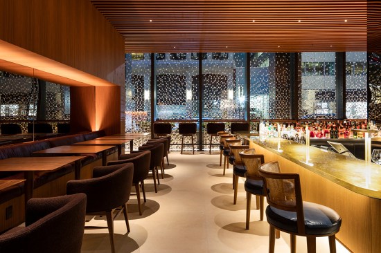 Bar seating area showing table lamps, beaded curtain, and seating niche, Four Seasons Restaurant, New York