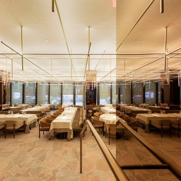 Dining room set for breakfast with custom tubular pendant, Four Seasons Restaurant, New York