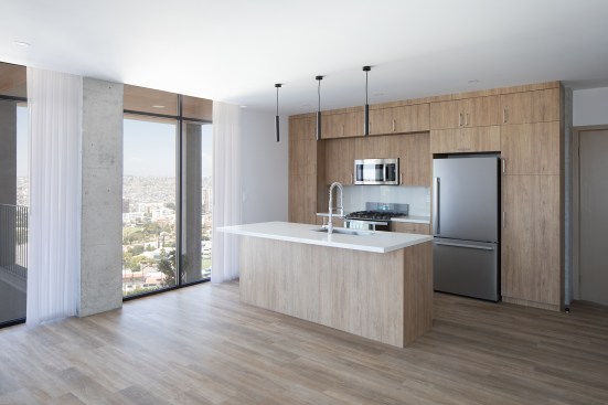 Each of the 12 units features white quartz countertops and Urrea kitchen and bathroom fixtures.