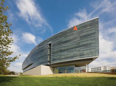 Aluminum curtain-wall system  Simmons Building  Products  Custom curtain-wall system  • Clear anodized aluminum structure  • Low-E insulated glazing units with a combination of Viracon clear vision and fritted glass  • Vertical structural glazed mullions with 4-inch-deep prefinished horizontal mullion covers  • Color of mullion covers matches metal panel system 