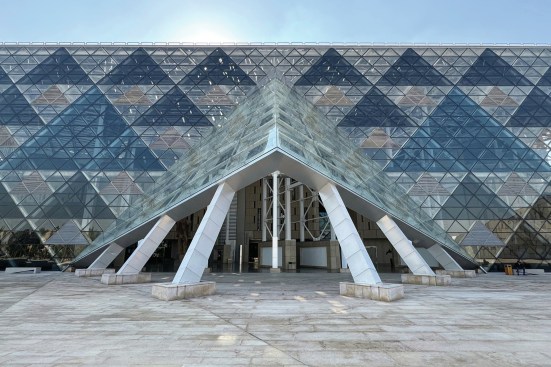Open-air entrance to the glazed atrium on the north side of the museum.