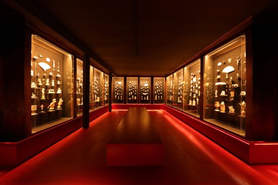 Existing wall displays use linear LED fixtures to highlight the contents within.