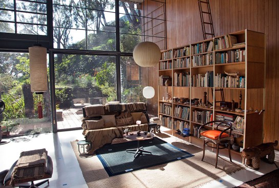 The restored tallowwood wall paneling in the Eames House living room