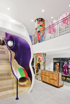 The “Biotopological Scale-Juggling Escalator,” a tunnel-shaped stairway. Designed by Madeline Gins, a visionary architect, it connects the second and third floors.