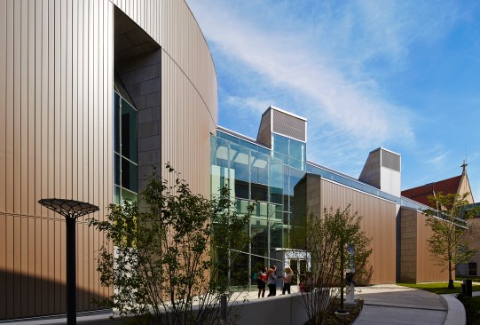 Exterior view from southwest, showing solar chimneys