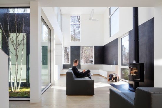 Double-height living area with internal courtyard (at left)