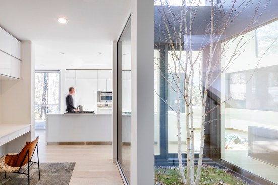 View into kitchen past internal courtyard (at right)