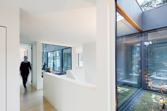 Second-floor hallway with view to green roof