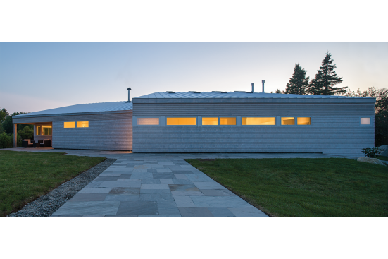 A narrow band of windows on the inland side of another house—Shantih, in Hunts Point—contrasts with its double-height seaward façade.