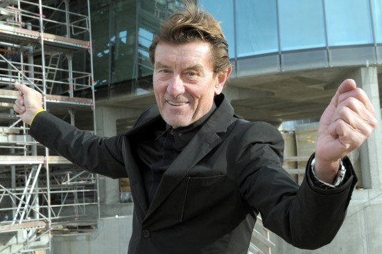 Helmut Jahn stands in front of the shell of the Sign Düsseldorf tower in Germany (2009).