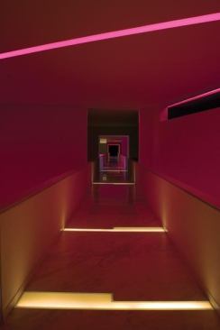 Color is used to accent one of the hotel corridors.