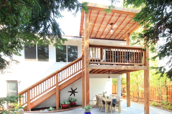 Influencer and HGTV host Orlando Soria helped his parents realize a new kitchen with an attached, elevated deck space. Large Humboldt Redwood timbers were crucial to the project’s success.