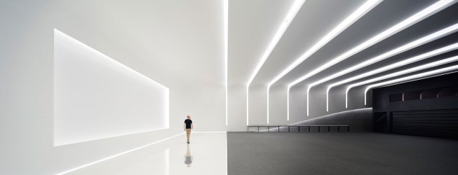 Out of sight stagelights provide 50 vertical footcandles. A line of light aroudn the stage emphasizes the ethereal feel of the space.