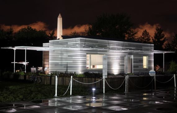 After a stormy day, Illinois shines brightly at night on Friday, Sept. 23, 2011 at the U.S. Department of Energy Solar Decathlon at West Potomac Park in Washington D.C., Sept. 23, 2011. (Credit: Stefano Paltera/U.S. Department of Energy)