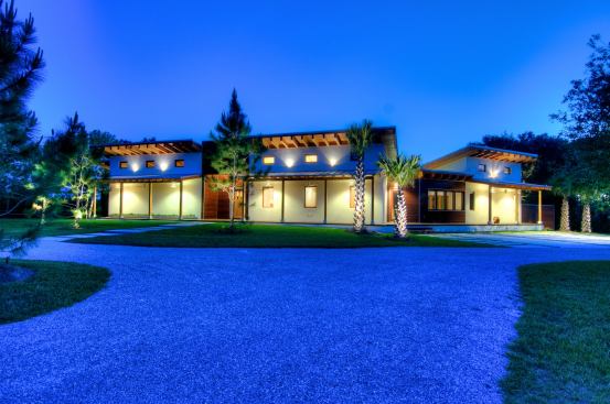 Large roof overhangs help with passive cooling, while also providing a larger surface for solar panels.