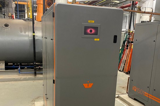 The 1.5-million-Btu Intellihot water heaters fit into a 3-by-6-foot footprint, offering immense space savings compared with the previous boiler system.