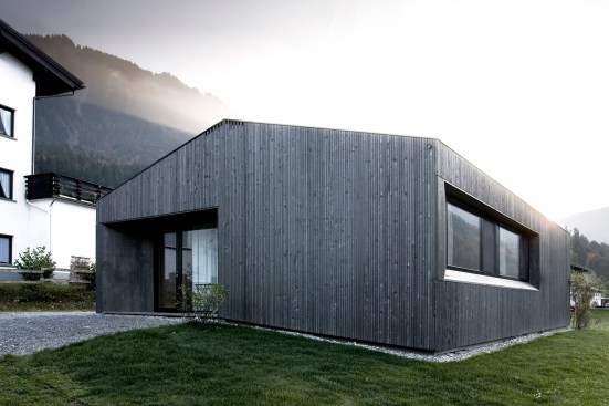 The clean minimalism of Mellau, Austria, residence Haus für Gudrun is reinforced by thin-plank paneling on its interior and exterior.