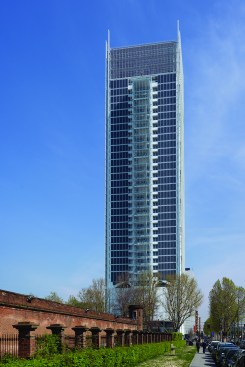 South façade with photovoltaic panels and stair with internal hanging vegetation