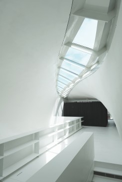 The complex, curving skylight over the living area was fabricated by Chukar Waterjet.