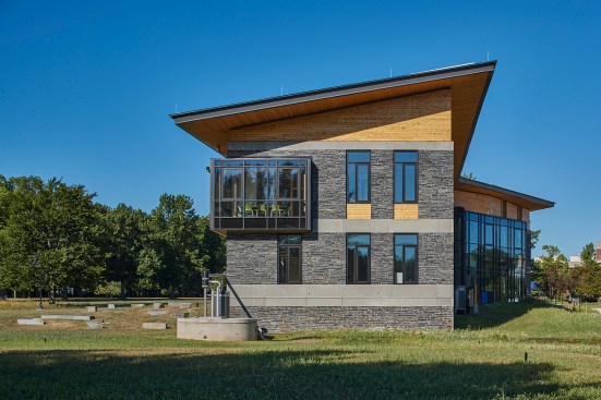 Rainwater collected by the roof is stored in concrete cisterns.