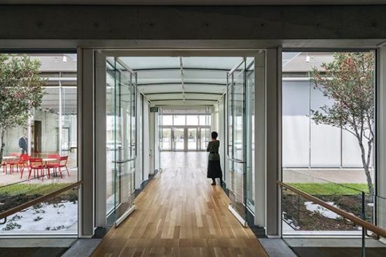 View, from the west, of the passage to main lobby of the Piano pavilion and to the Kahn building beyond.