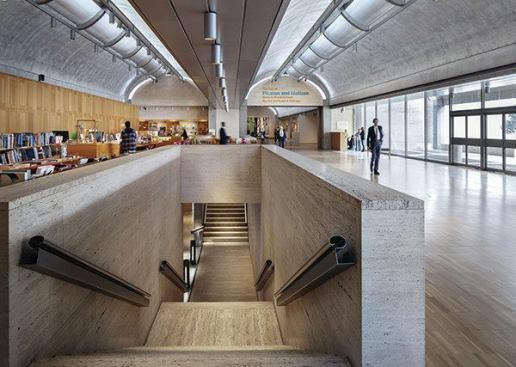 The entry of the Kahn Building and its signature ceiling reflector system allows daylight to illuminate the interiors.