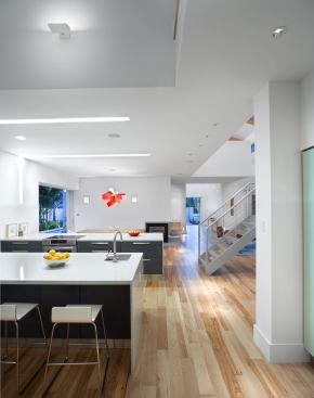 The kitchen boasts Energy Star appliances and quartz countertops. Most of the flooring in the main living areas is FSC-certified hickory.