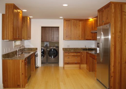 The barrier-free kitchen features reclaimed antique pine cabinetry and Energy Star appliances.