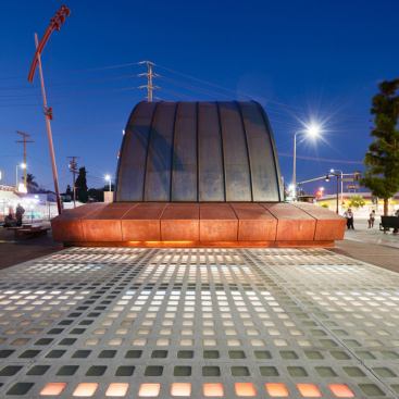 At street level, the station glows from within.