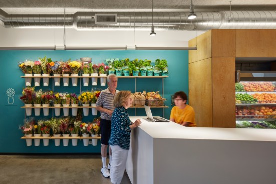 Custom shelf holds Lakeview Pantry's signature bouquets offered to clients.