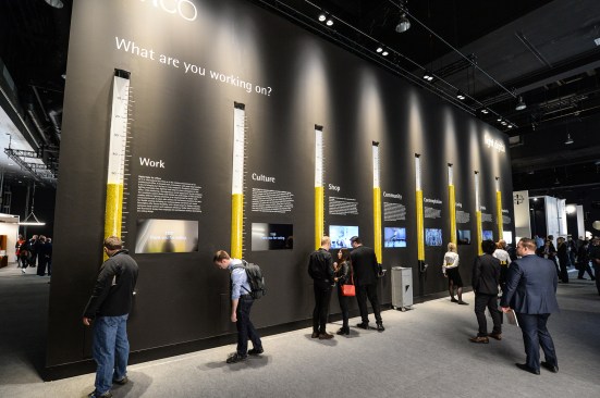 Erco's stand at Light+Building 2016. Visitors were asked about what types of projects they are working on and voted via the candy dispensers for each project type.