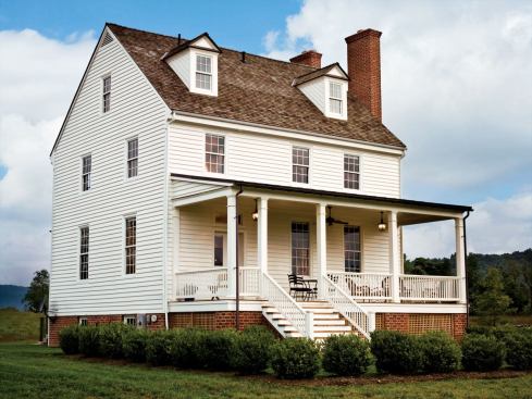 Homeowner/builder Tom Glass recreated a long-gone porch on the home's rear elevation.