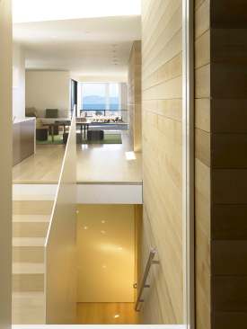 The design emphasizes roomy spaces and a constant view of the bay.