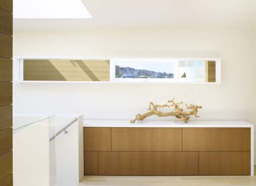 The space is defined by a minimalist flair and sleek surfaces.