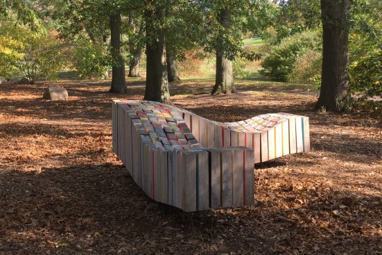 Located at the Cornell Botanic Gardens, in Ithaca, N.Y., this multicolored sculptural bench comprises a grid of 264 CNC-milled square timbers.