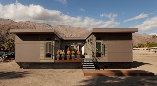 The three-bedroom, two-bathroom C6 is designed around a central courtyard with living spaces in the center module and bedrooms and storage in the perpendicular modules on either side.