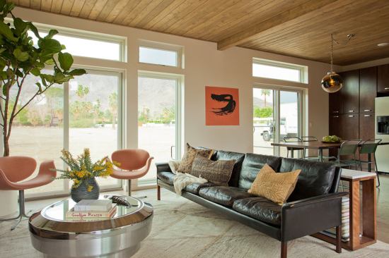 Natural touches such as cork floors and wood millwork provide a warm feel in the living room.