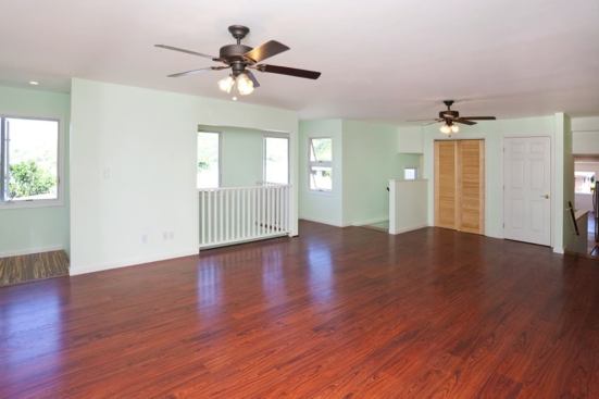 Operable windows and multiple ceiling fans help keep the home comfortable even in the summer. The house has no air conditioning system.