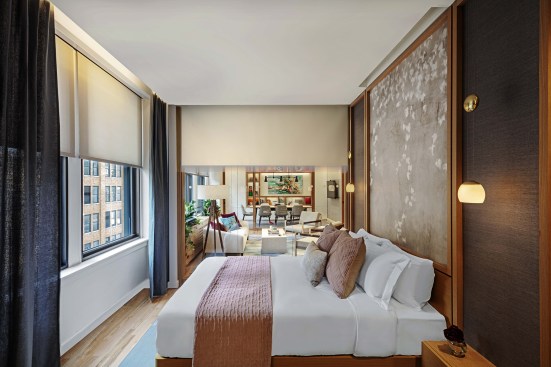 A mock hotel room is outfitted with Lutron's MyRoom lighting, temperature, and shade control system.